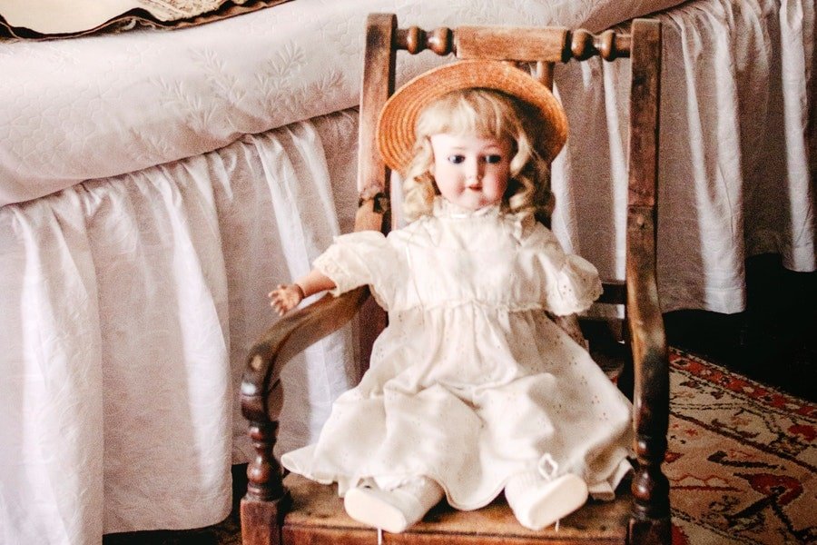 a doll in a sitting position